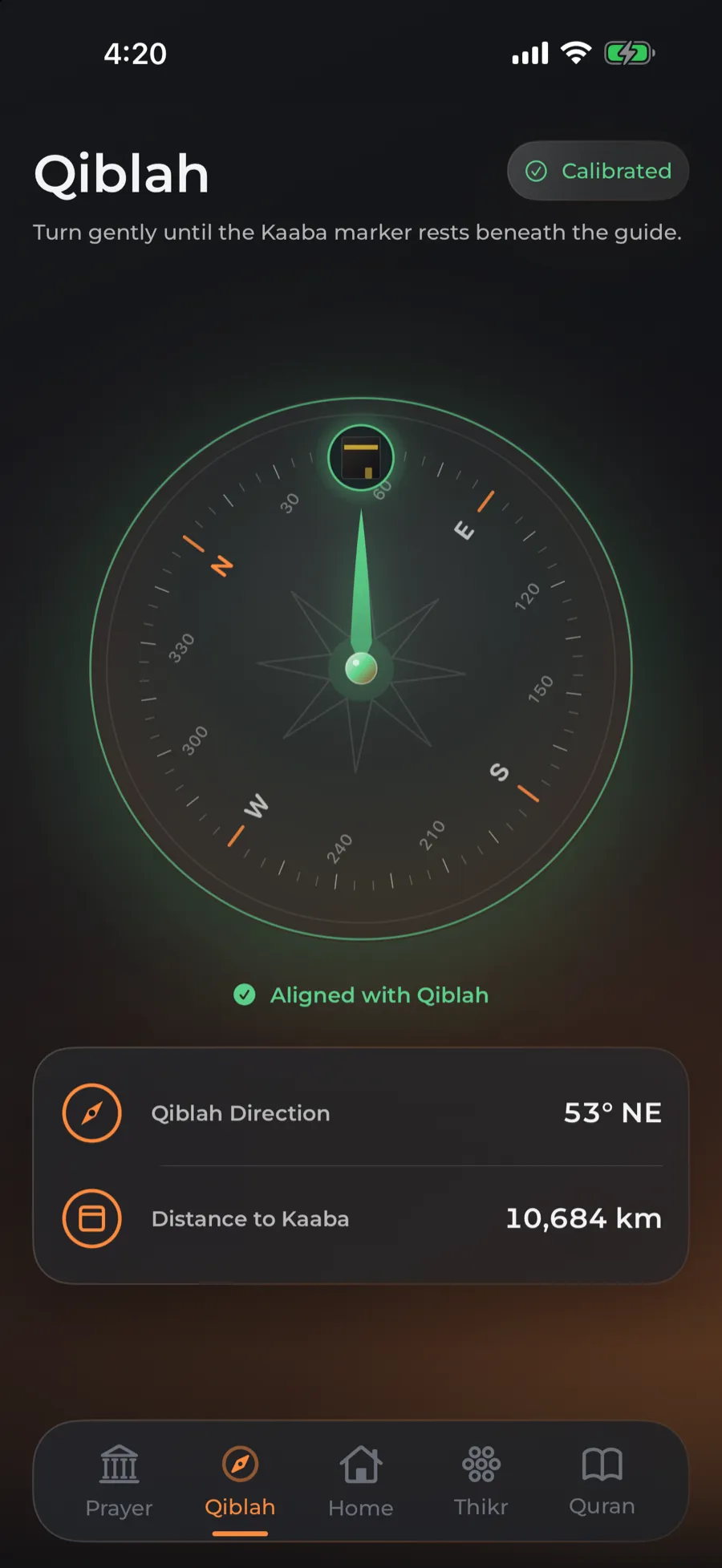 The Qiblah compass pointing toward the Kaaba.